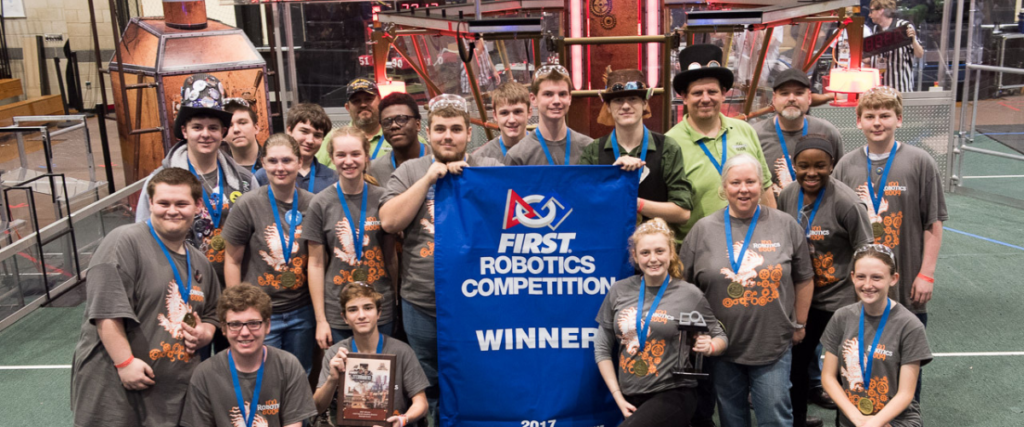 Team 6004 on the Steamworks Field after winning in Raleigh